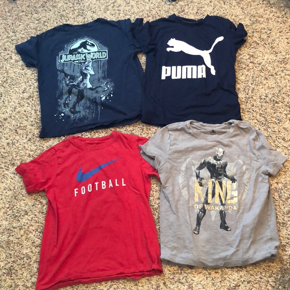 Bundle of four boys shirts - size 7